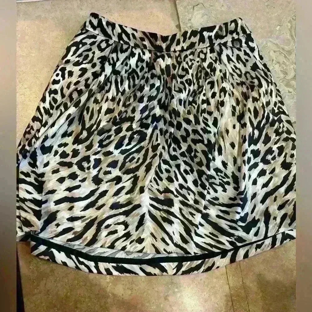 White House Black Market animal print satin a lined skirt. Size 10.